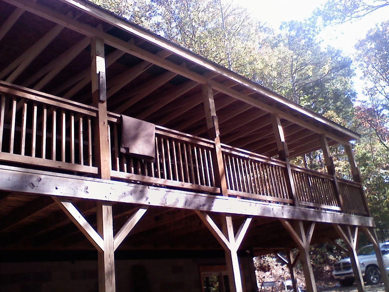 Timber framing under a new elevated porch and deck — Roof Leak Repair in Bearcreek by Roofing Brothers